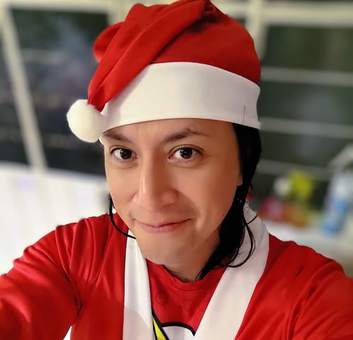 Celebrating pride month_Adradia Tinajero García dressed up as Santa during a 10k run