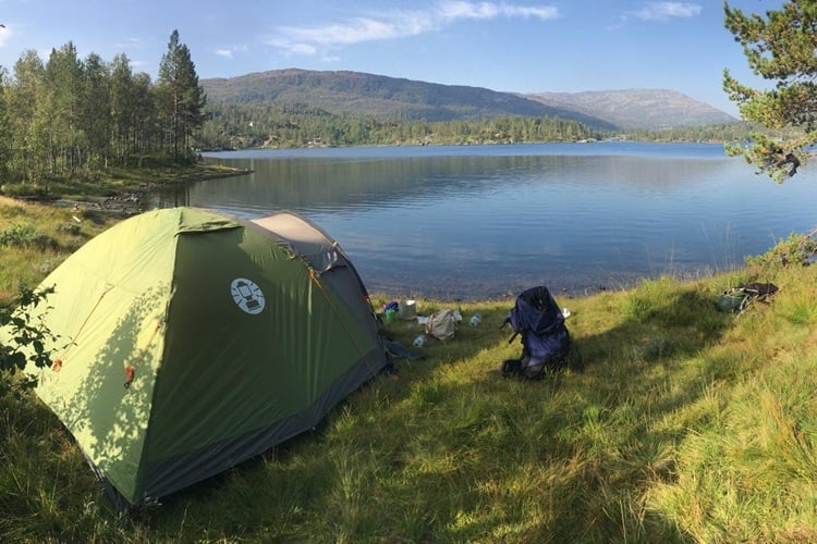 Joshua camping at the lakeside