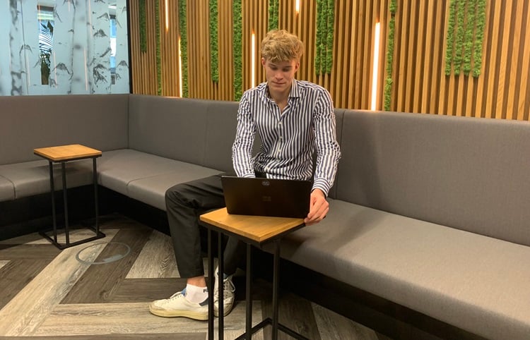 A photo of Moritz in the Austria office during his summer internship