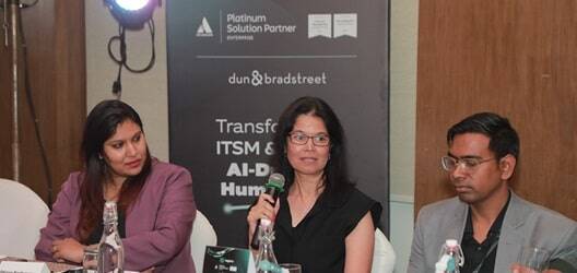 Roundtable attendees in a discussion