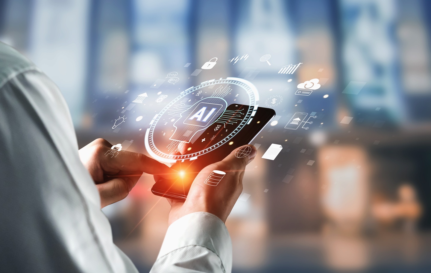 A man holding a smartphone in his hand with digital overlay of AI icons