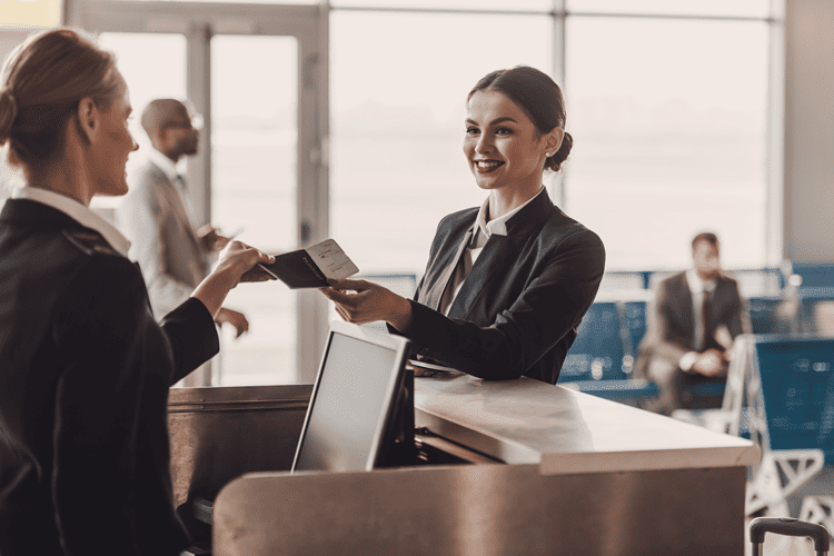 A passenger checking in at an airport terminal
