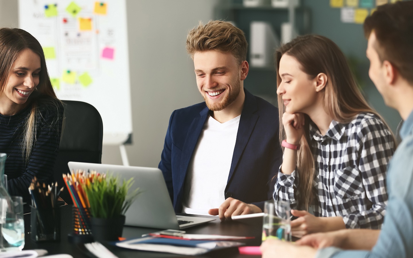 Group of employees discussing a project