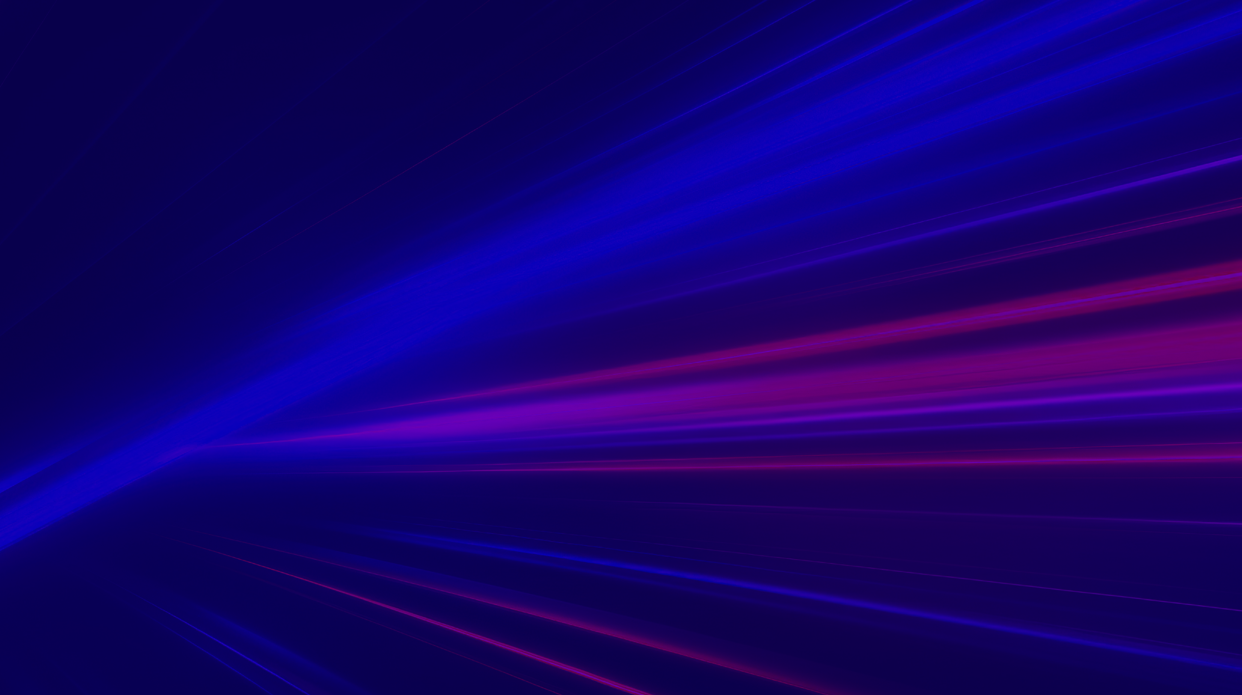 Blue background with streaks of light, resembling a digital wallpaper.