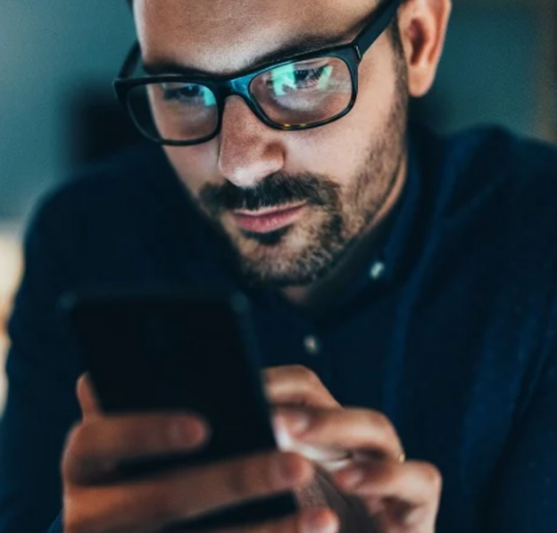 A man working on his phone