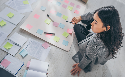 Woman working on a task board