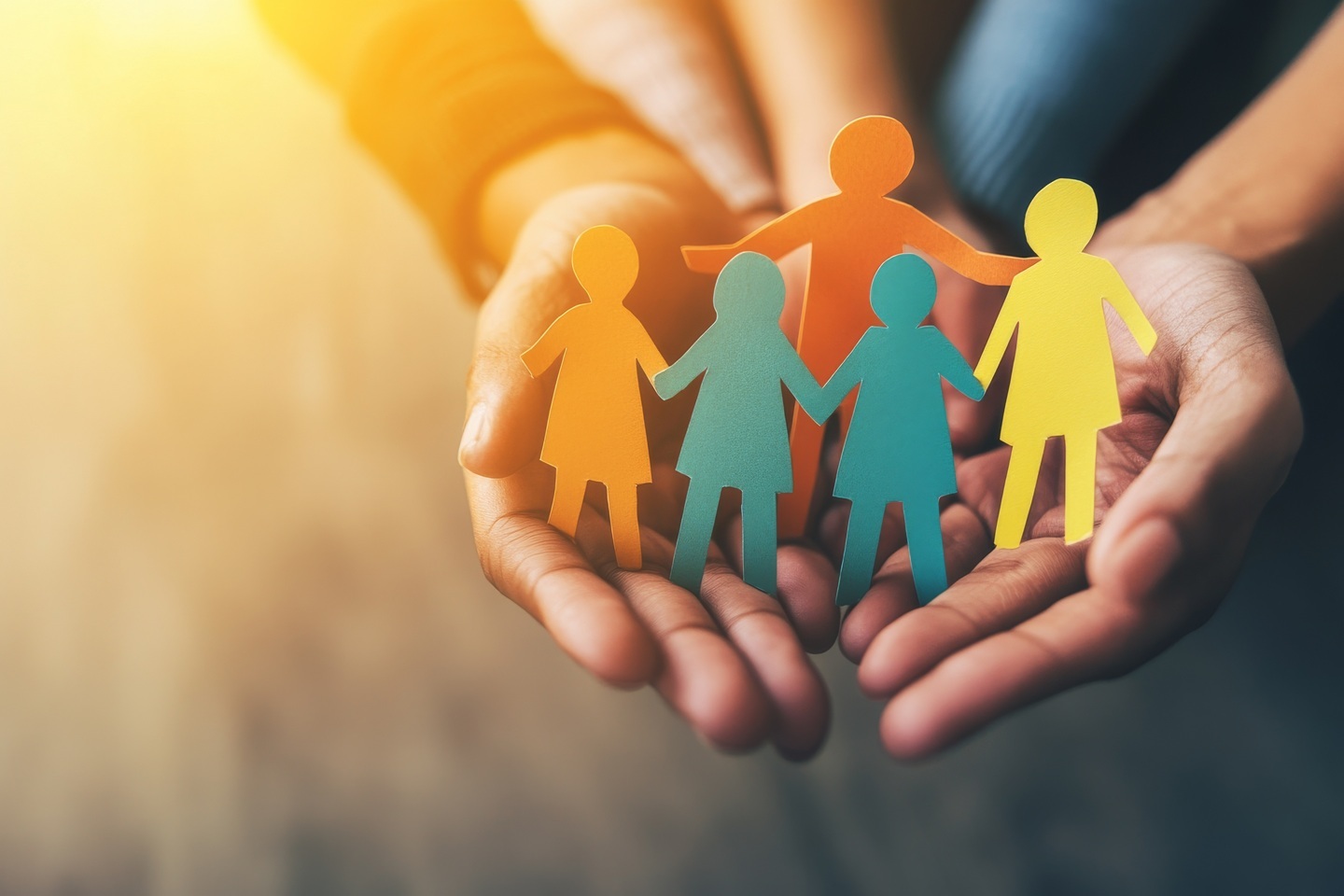 Hands holding Paper Cutout Symbolizing of people