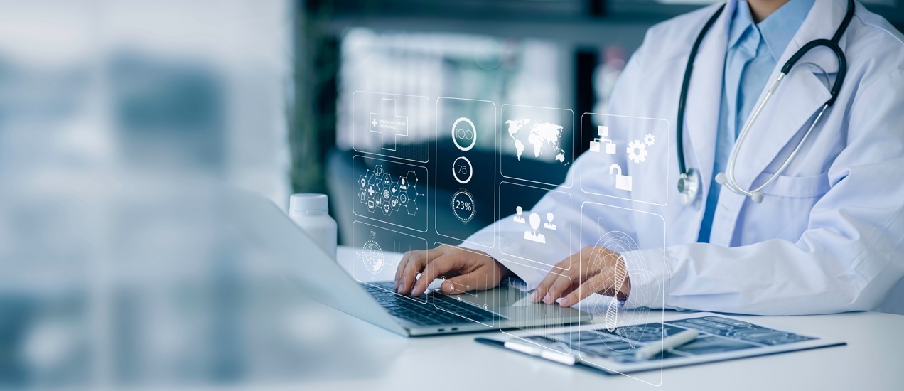 Healthcare-professional-working-on-a-tablet