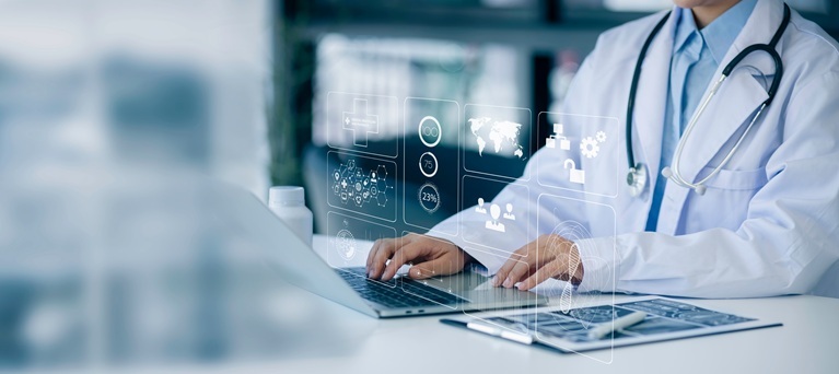 Healthcare-professional-working-on-a-tablet