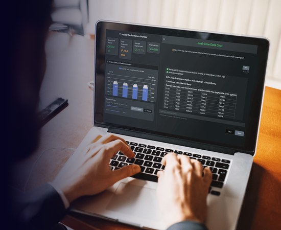 Man working on the OceanIQ platform on a laptop1