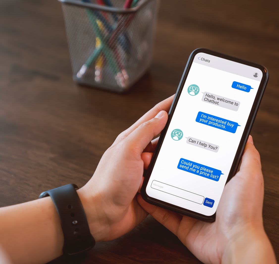 Man-chatting-with-a-chatbot-on-phone-1