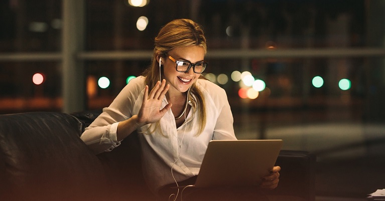 Woman speaking with someone using a tablet