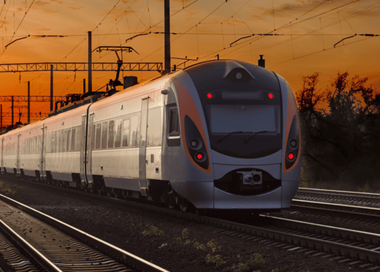Passenger train on railway tracks during sunset_ground transportation image_m