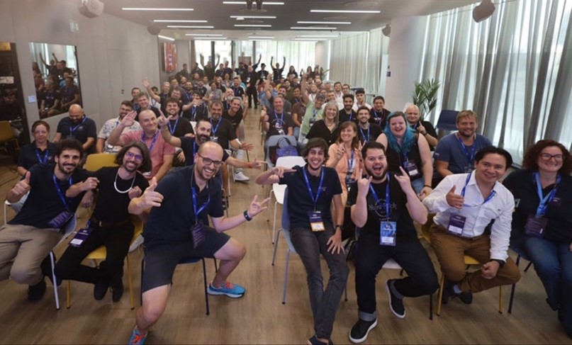 A group of people at AWS community day.