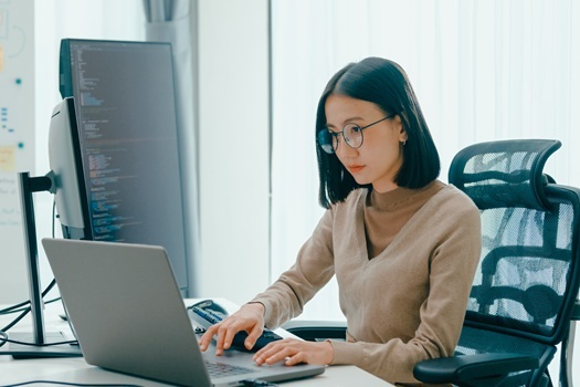A woman working on her laptop