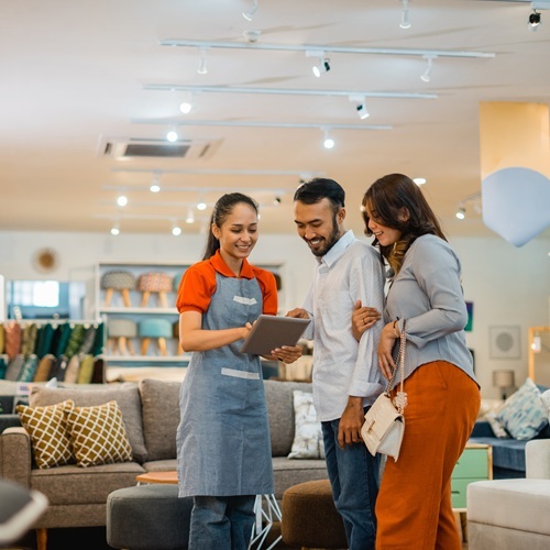Staff using automated systems at a retail store