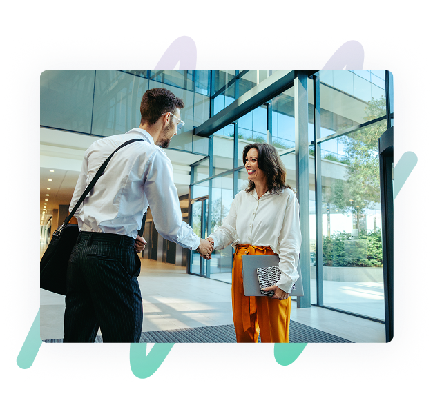 Two professionals shaking hands depicting HR personnel