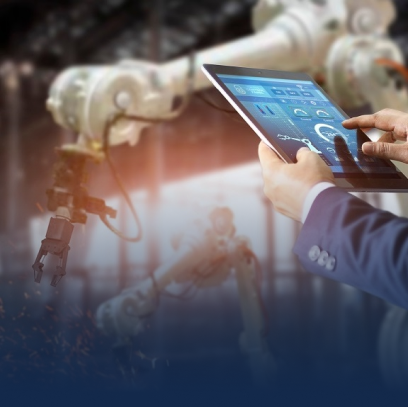 Man working on a tablet on a manufacturing facility